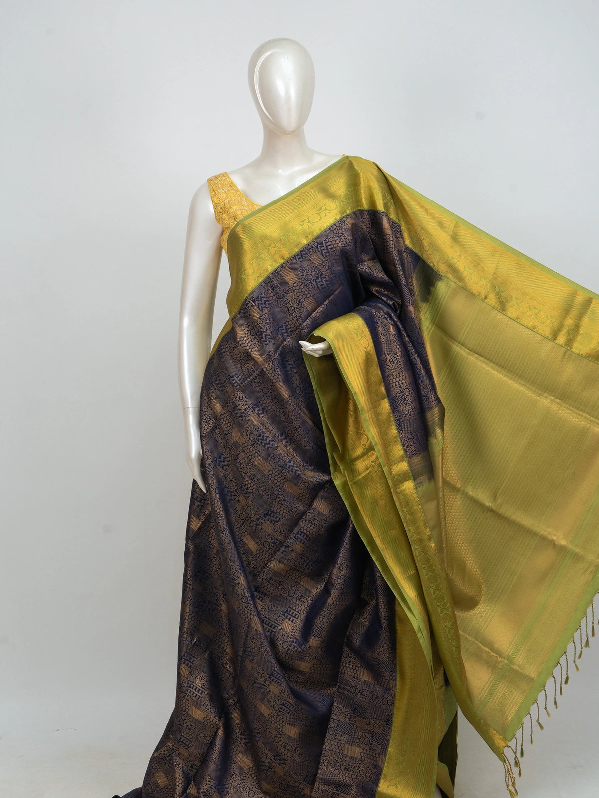 Navy blue Kanchipuram fancy silk saree with gold zari brocade body and contrast lime-green zari border