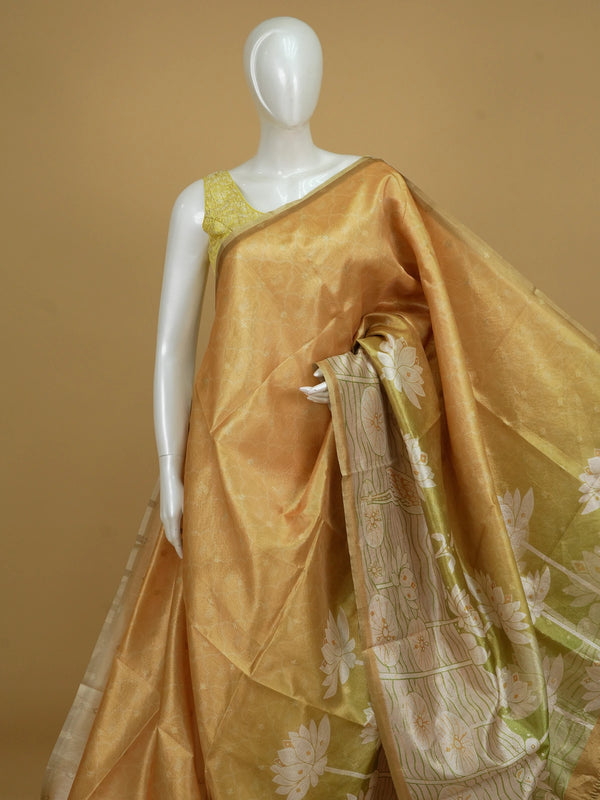 Mustard gold semi tussar saree with green lotus and crane printed pallu and gold zari border
