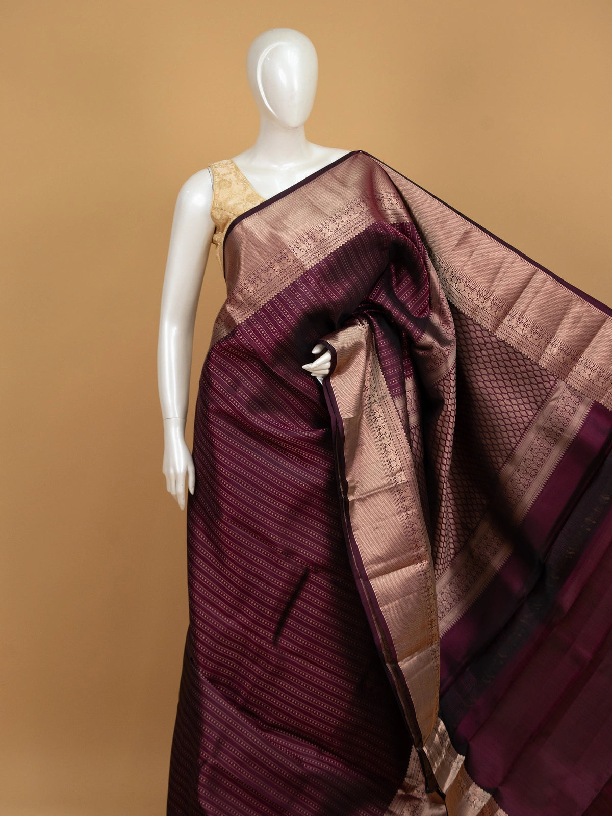 Wine purple pure Kanchipuram silk saree with gold zari striped body, contrast border and diamond jaali pallu