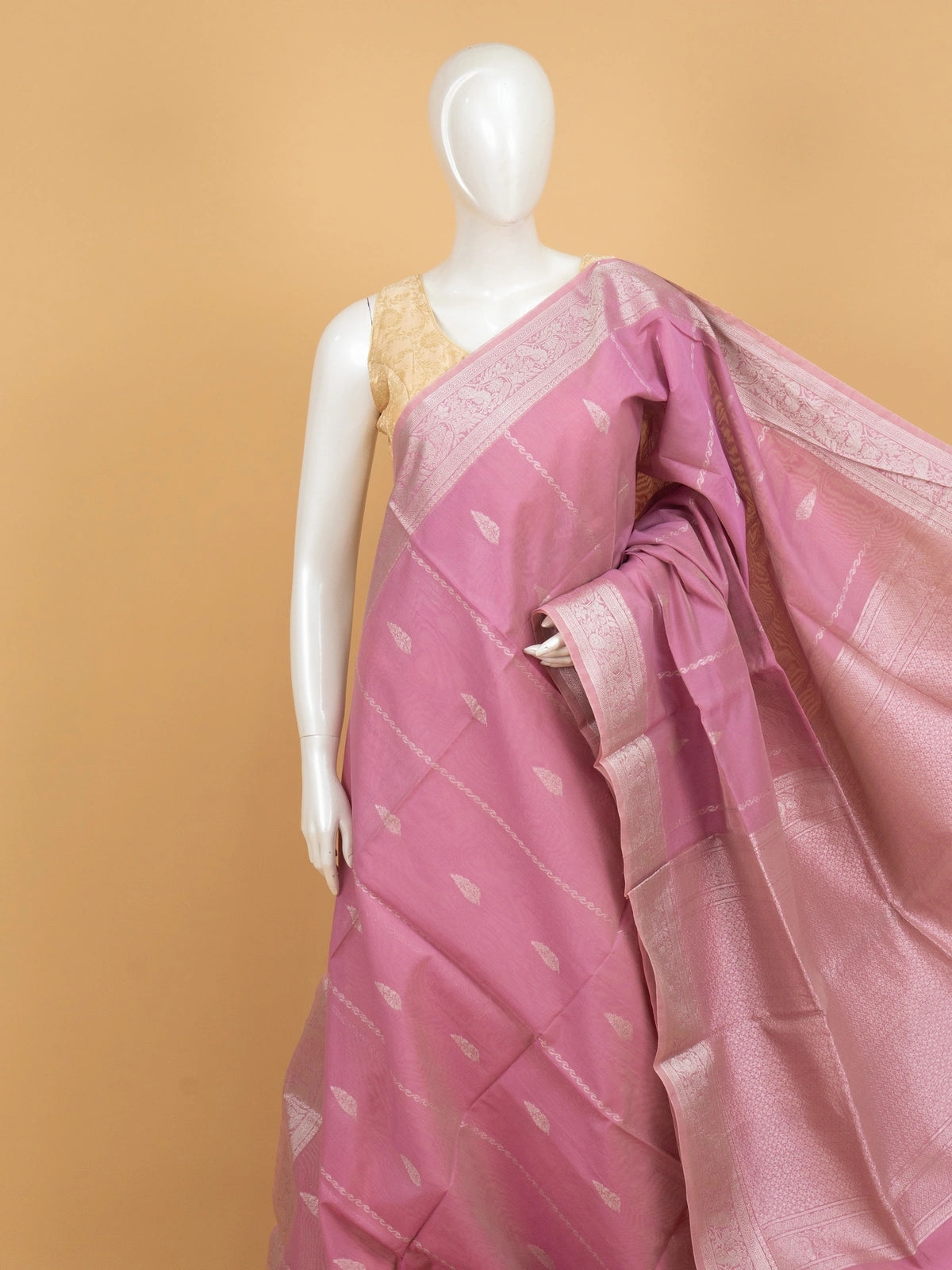 Pink silk cotton saree with silver zari buti motifs and ornate zari border
