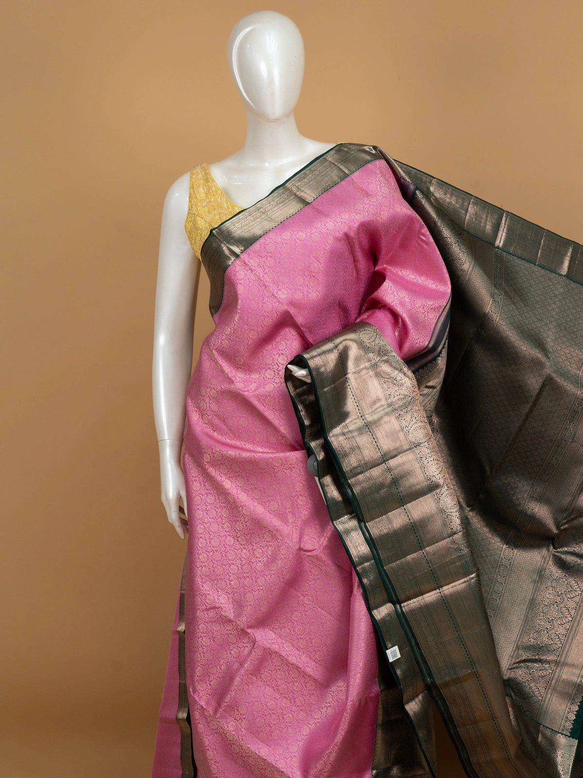 Pink pure Kanchipuram silk saree with contrast green gold zari border and pallu