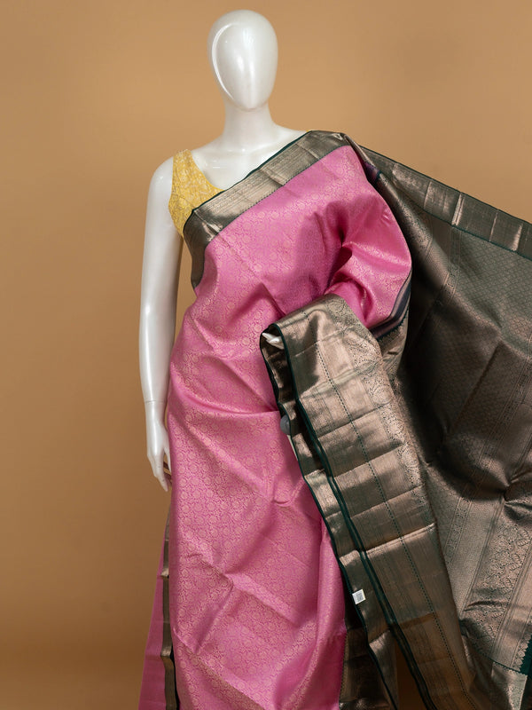 Pink pure Kanchipuram silk saree with contrast green gold zari border and pallu