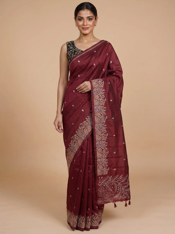 Maroon semi raw silk saree with embroidered pallu, buta motifs and contrast black embroidered blouse