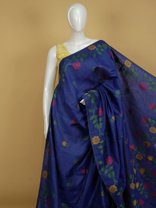 Royal blue linen cotton saree with multicolour woven floral motifs and a floral vine pallu
