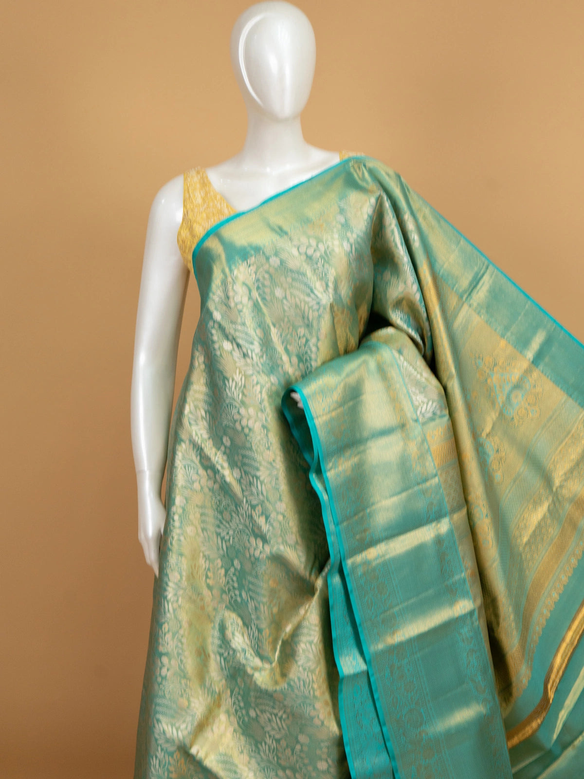 Teal green and gold pure Kanchipuram silk saree with zari floral weave and contrast border