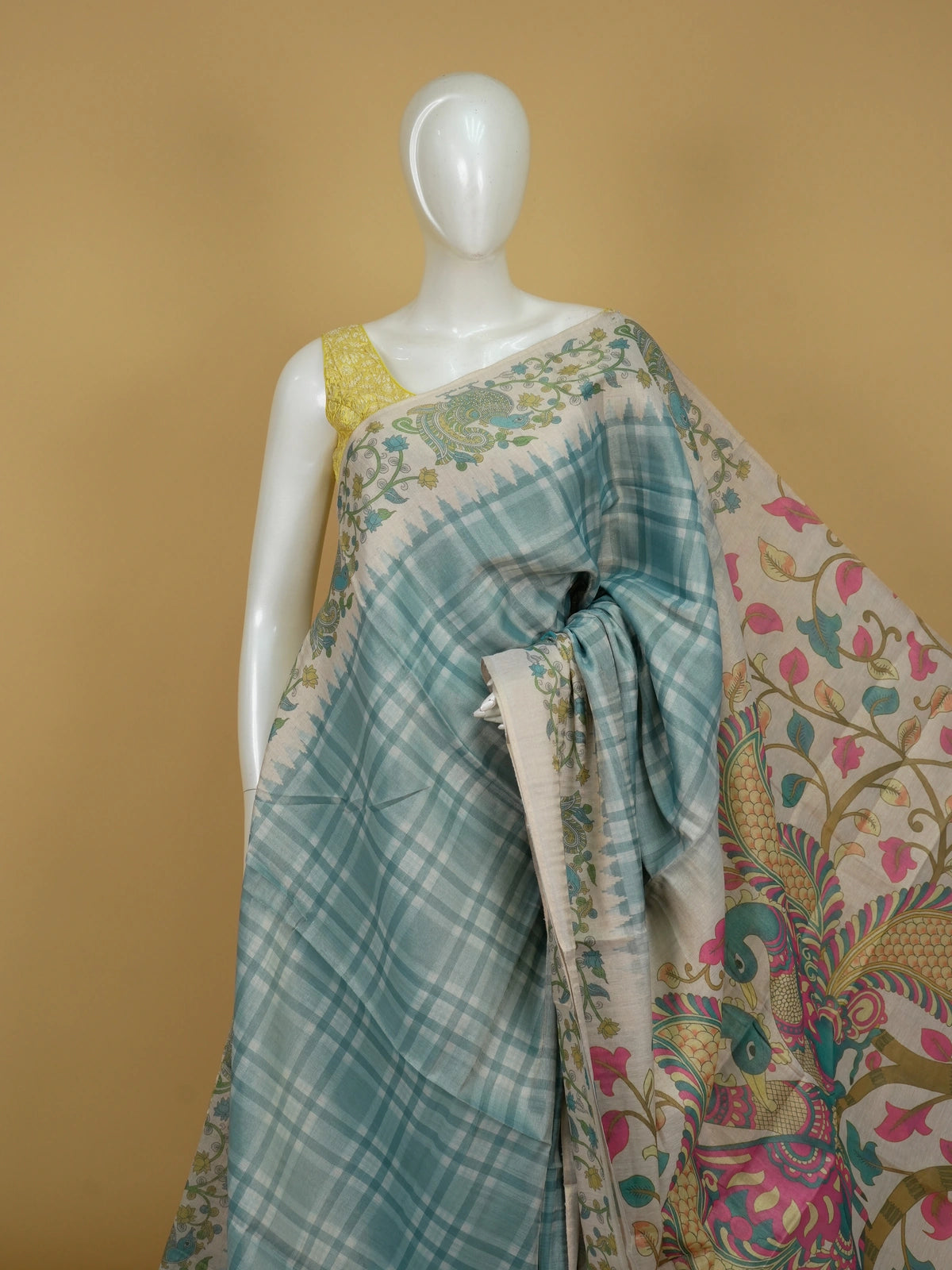 Teal blue and cream linen cotton saree with checked body and Kalamkari peacock printed pallu