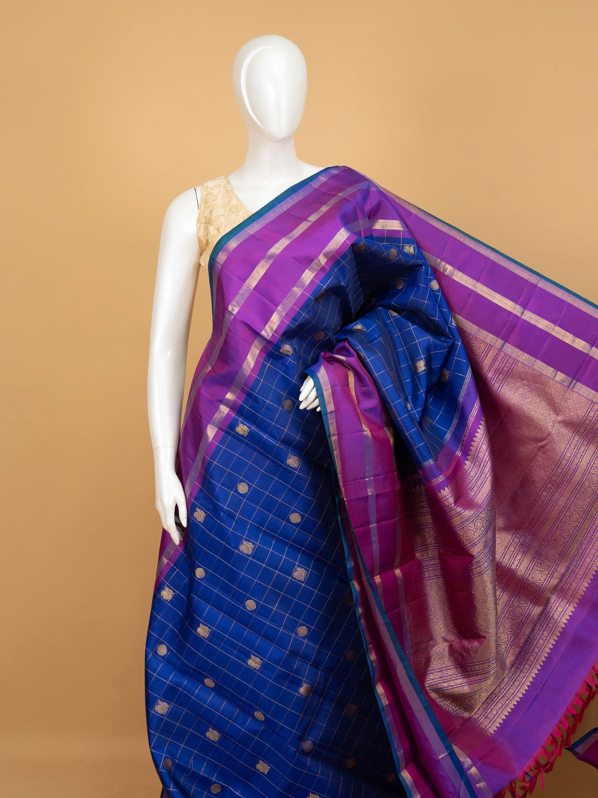 Royal blue pure Kanchipuram silk saree with gold zari checks and a contrast magenta zari border