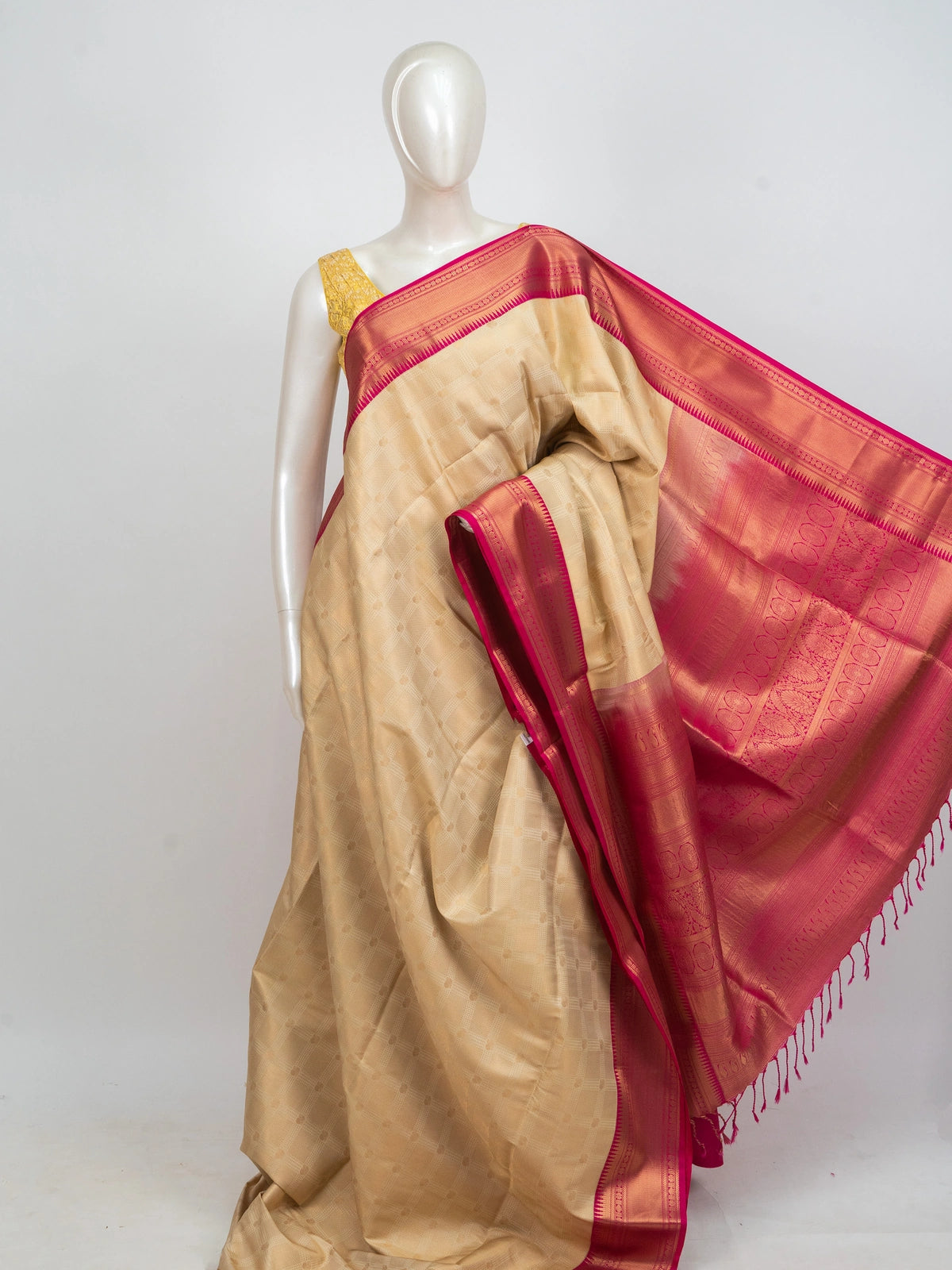 Cream Kanchipuram fancy silk saree with contrast pink gold zari border and woven pallu
