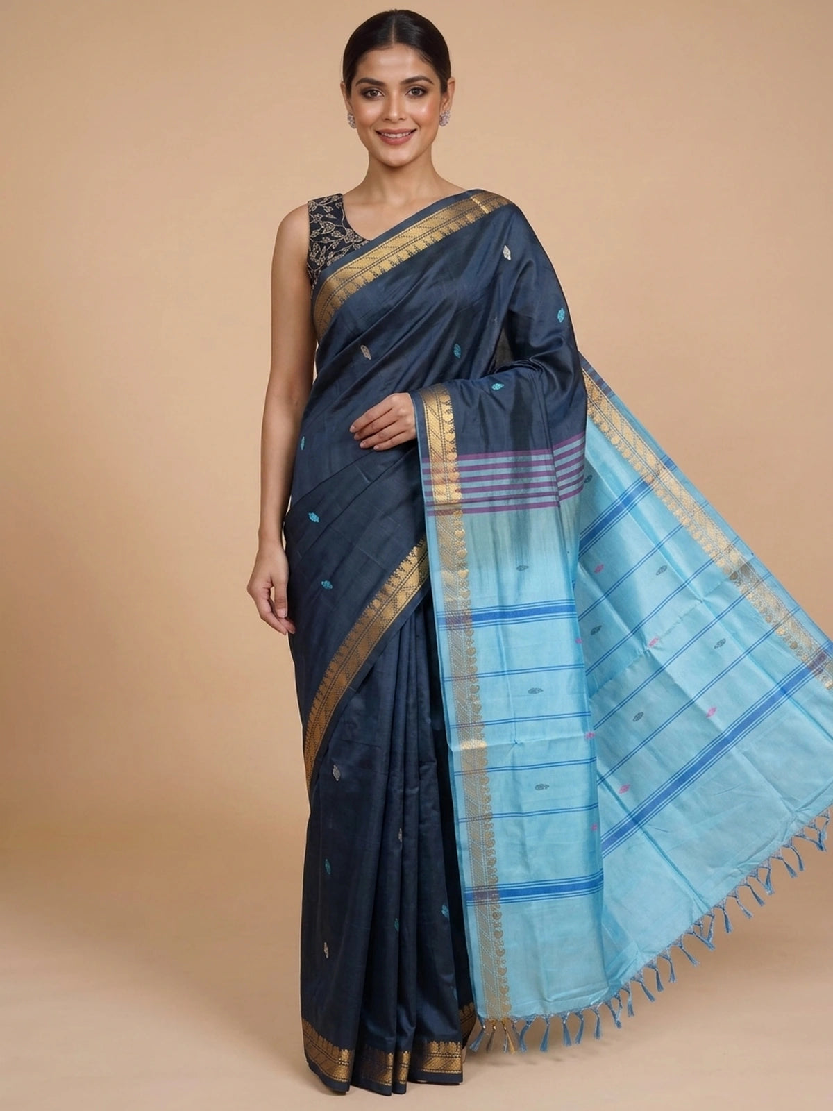 Navy blue Banana Silk saree with sky blue contrast pallu and gold zari border