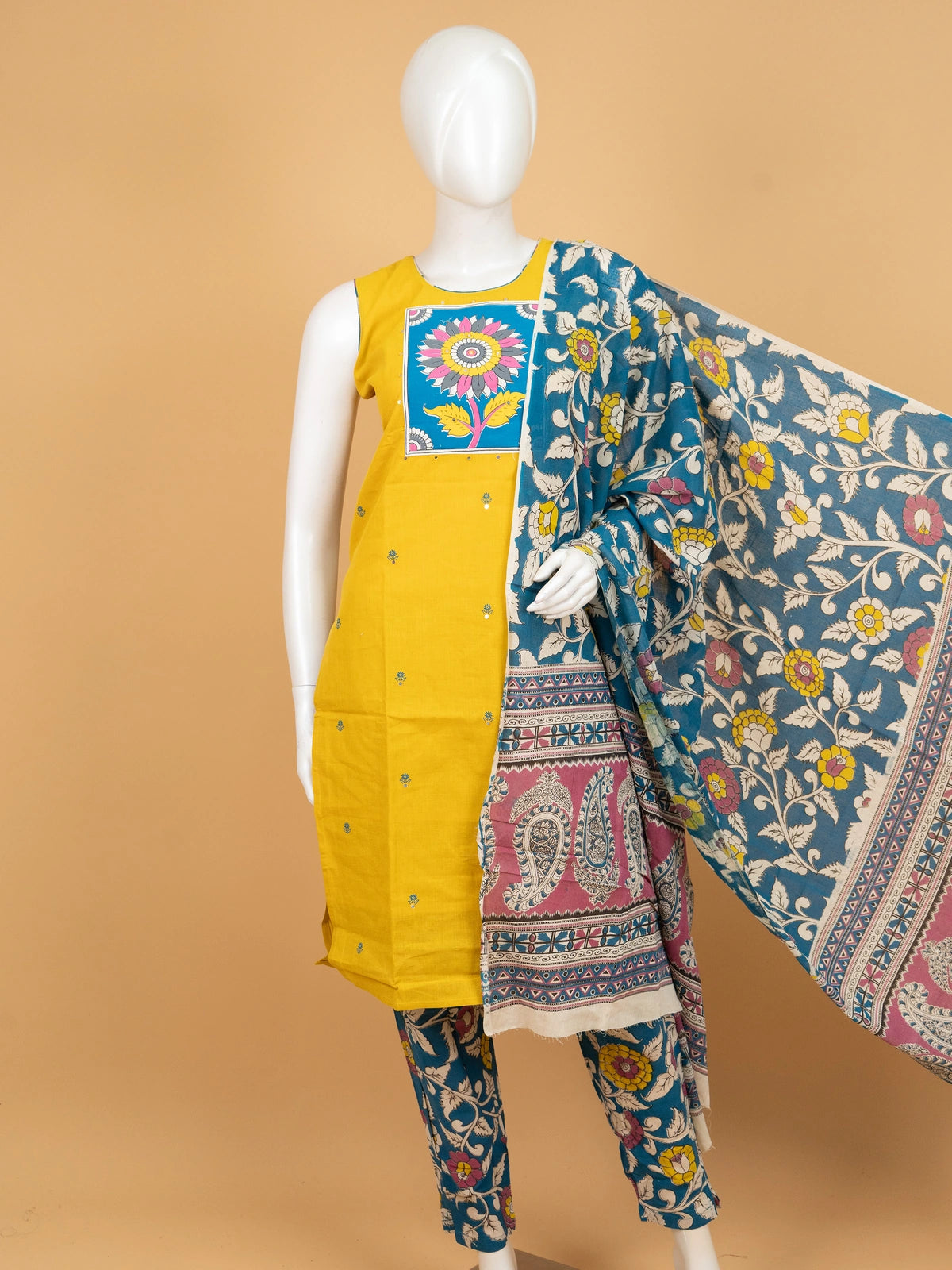 Mustard Yellow cotton straight cut kurti set with Kalamkari floral print yoke, teal printed pants and matching dupatta
