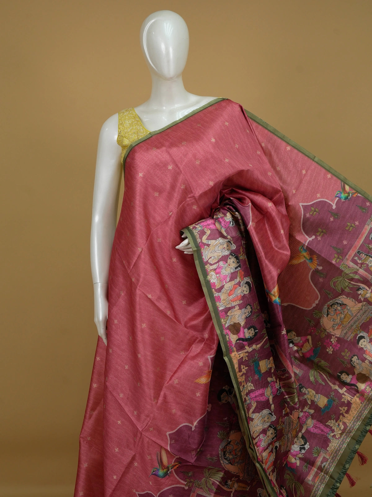 Rose pink semi tussar saree with gold butta body, green zari border and Pattachitra figurative pallu
