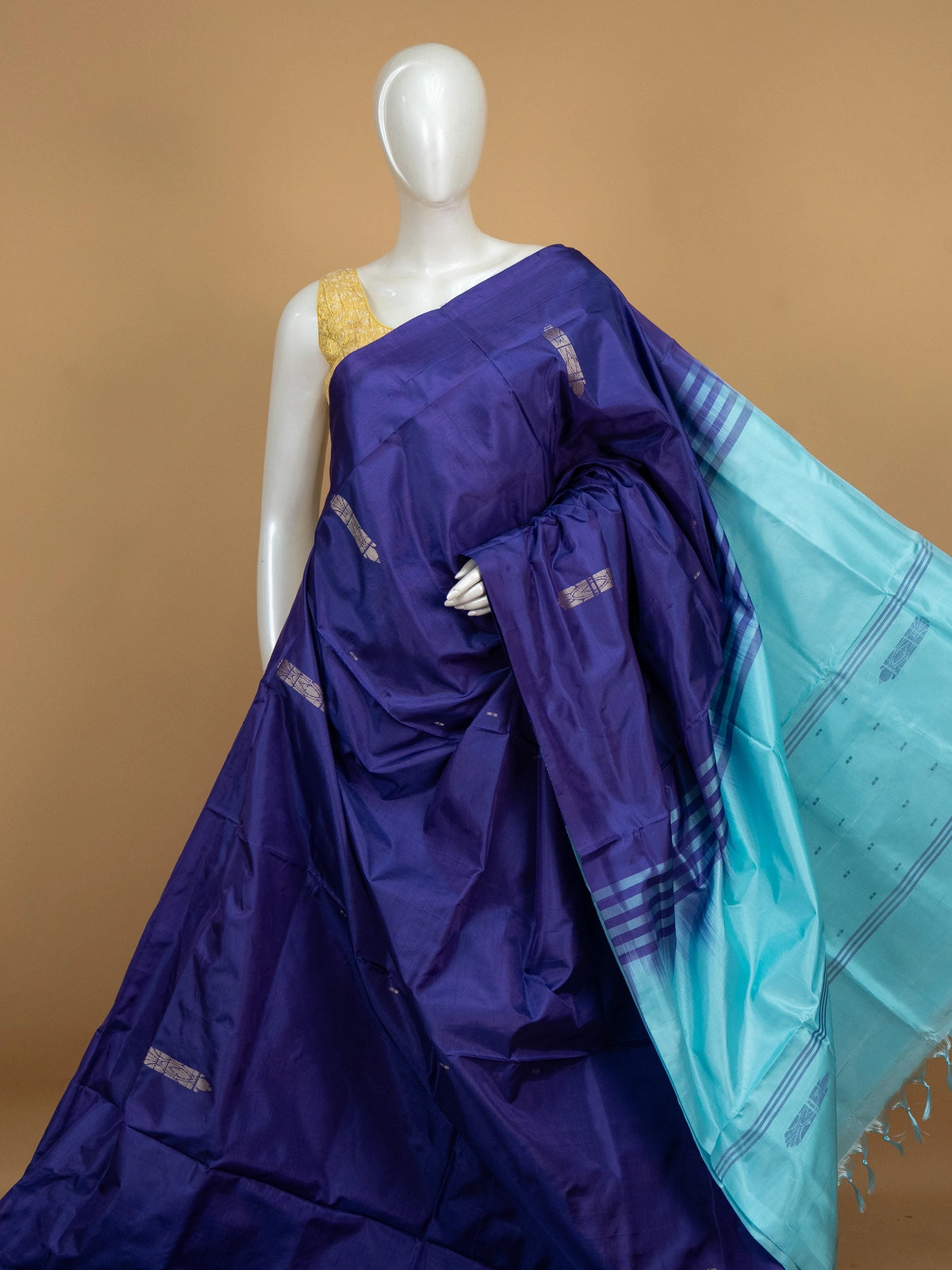 Royal blue banana silk saree with silver zari buttas and contrast turquoise striped pallu and border