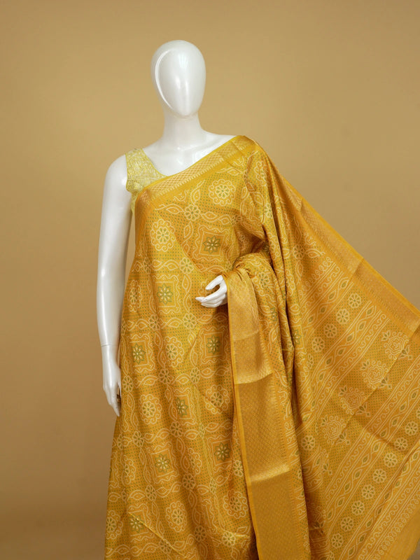 Mustard yellow bandhani print designer saree with gold zari border and banded pallu