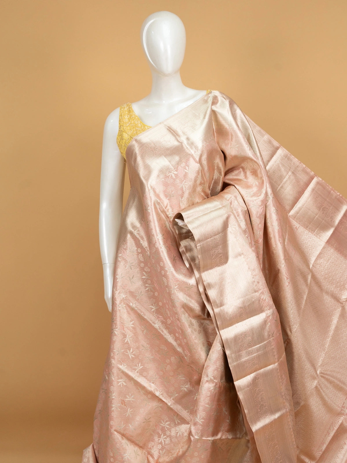 Rose pink pure Kanchipuram silk saree with silver zari floral and bird motifs and contrast zari border