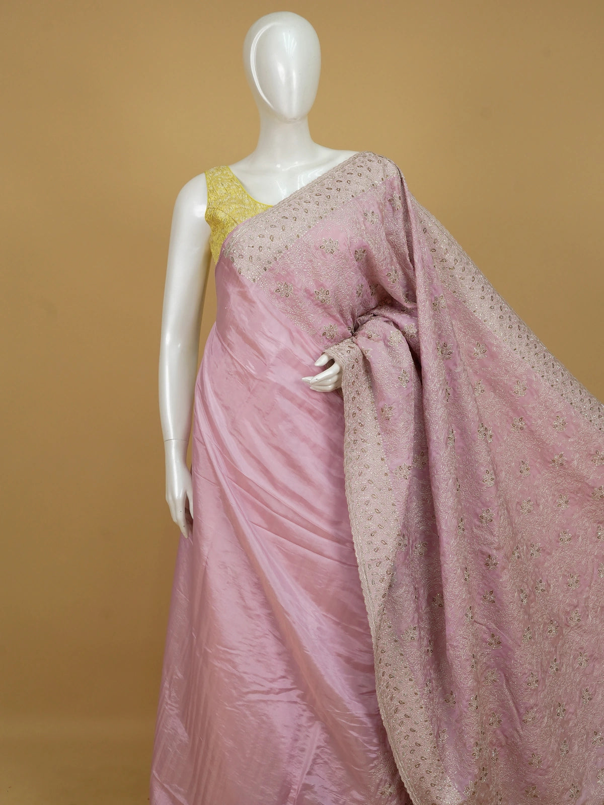 Dusty pink designer saree with all-over silver floral and paisley embroidery and an ornate border