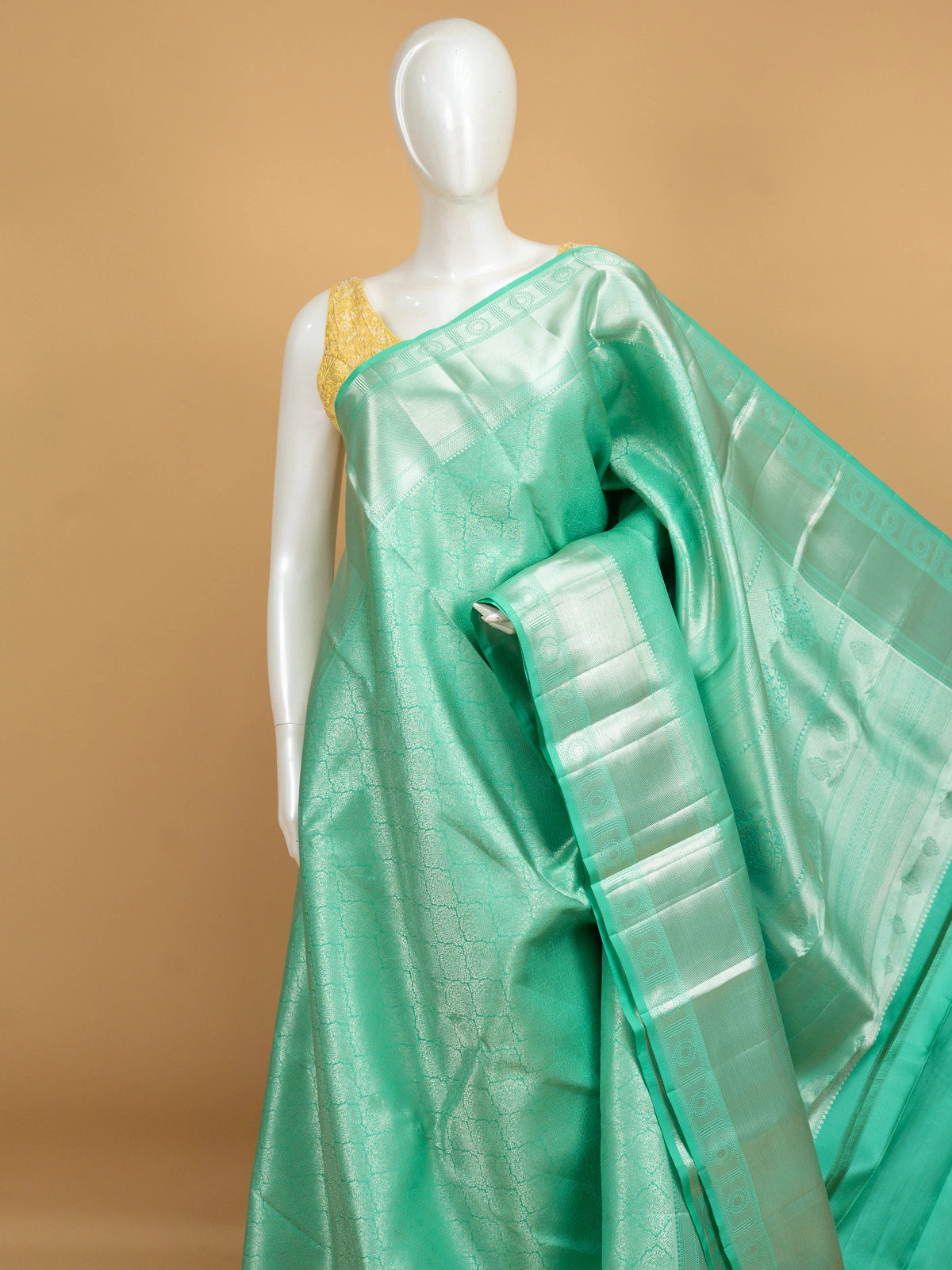Sea green pure Kanchipuram silk saree with all-over silver zari brocade and contrast border