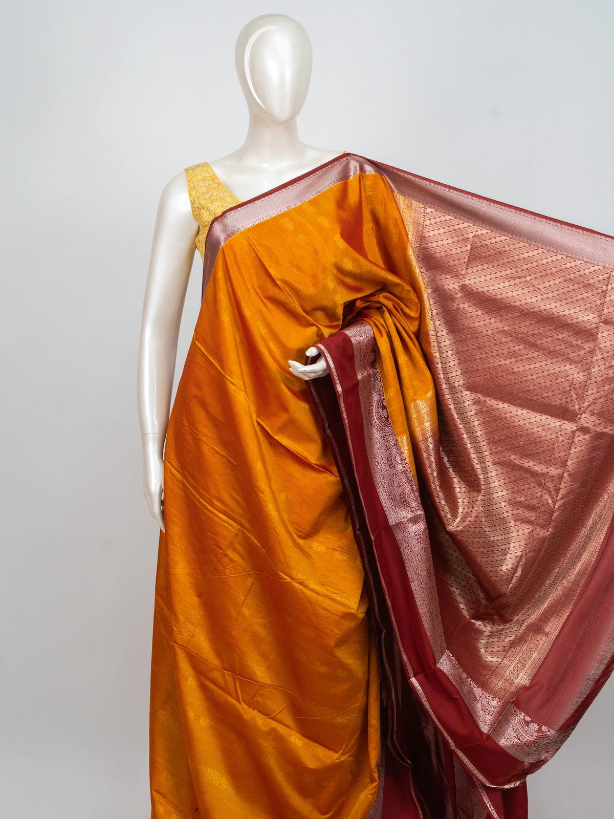 Mustard orange semi silk saree with maroon silver zari contrast border and woven pallu