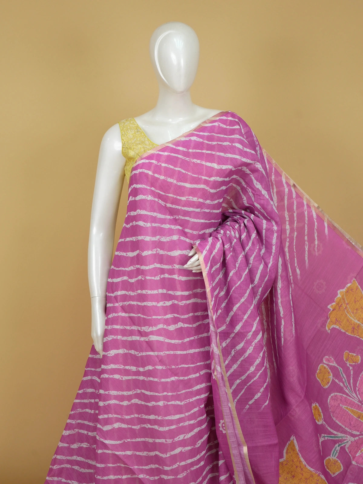 Pink and white leheriya linen cotton saree with batik floral pallu and gold zari border
