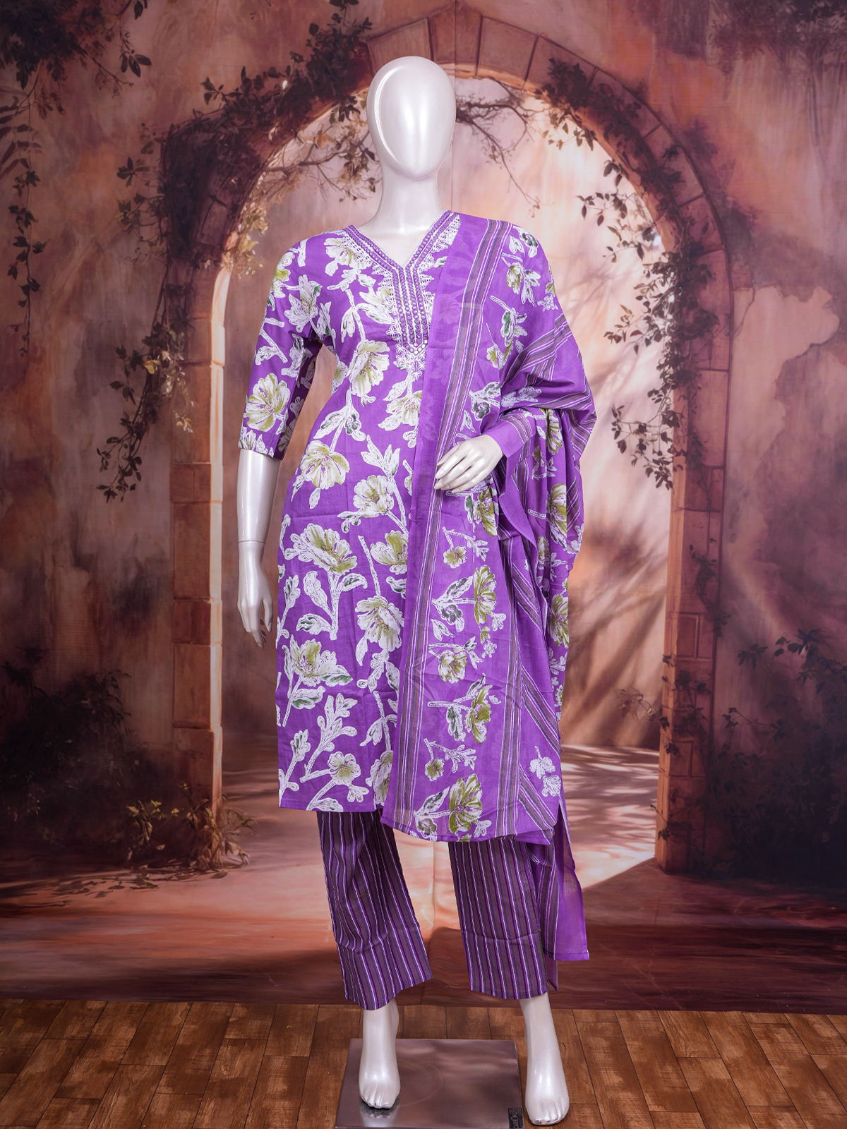 Purple floral cotton kurti set with mirror work neckline, striped pants and printed dupatta