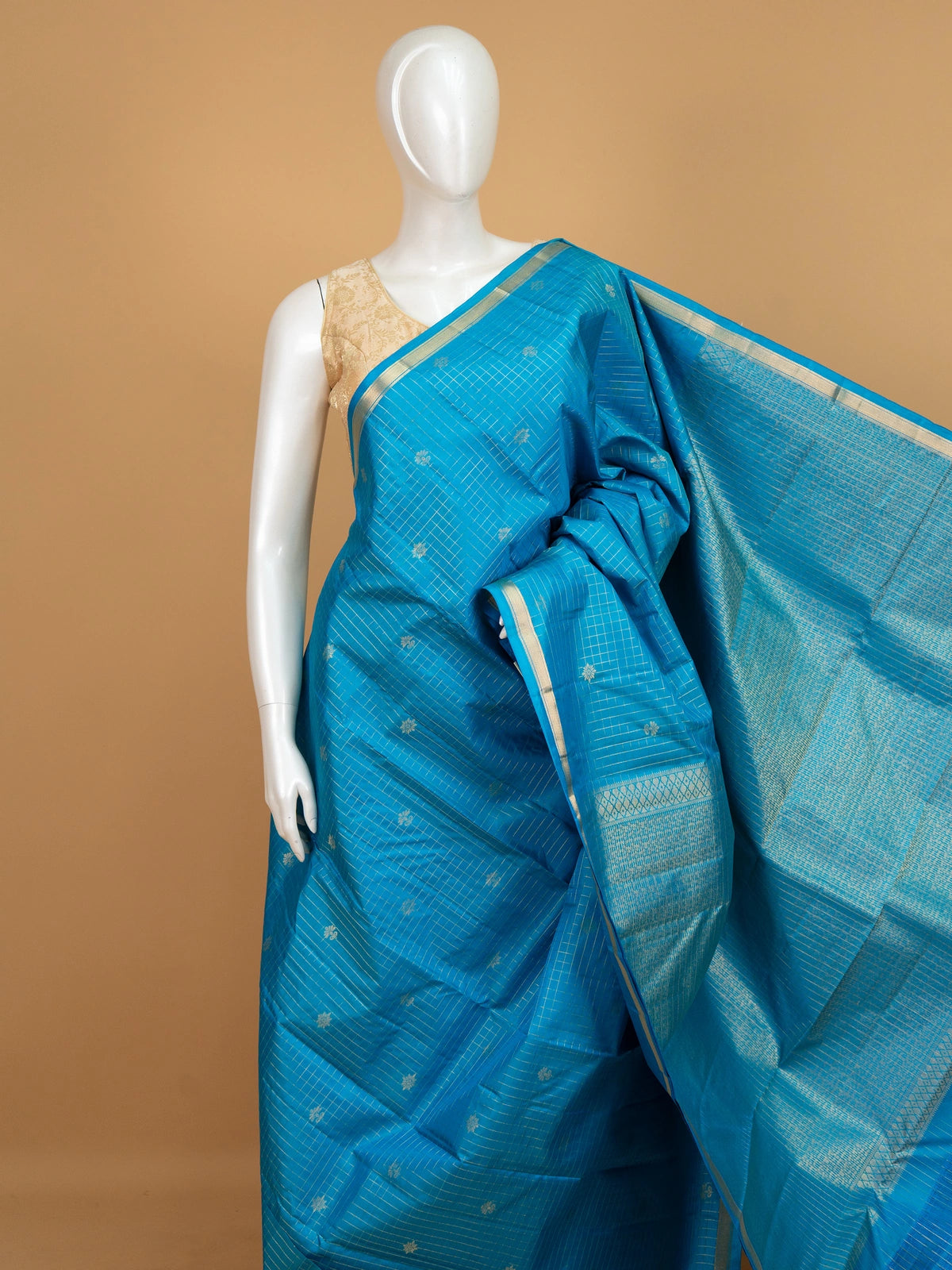 Peacock blue Pure Kanchipuram silk saree with gold zari checks, floral buttas and contrast gold border