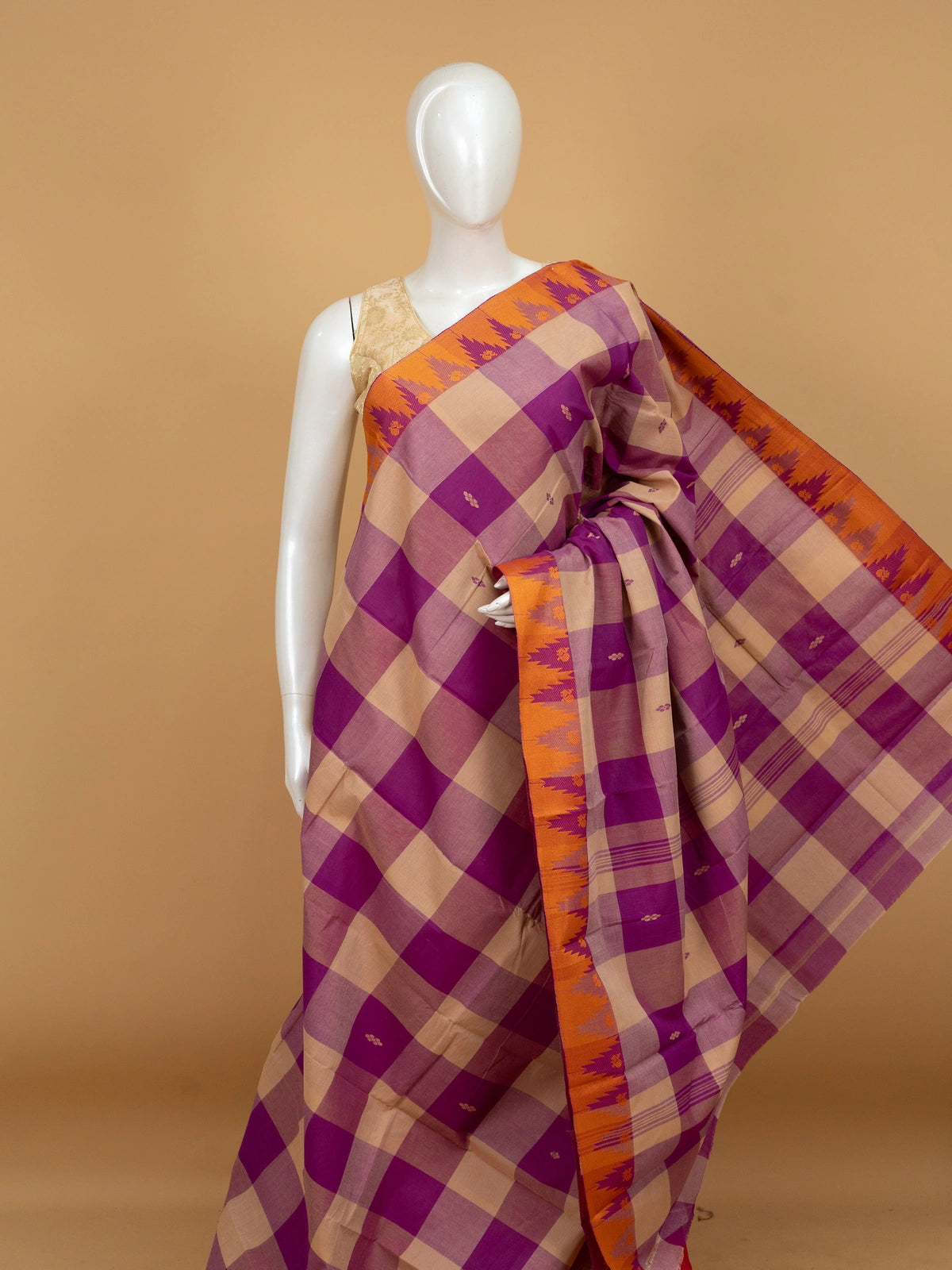 Purple and beige checked Chettinad cotton saree with contrast orange temple border