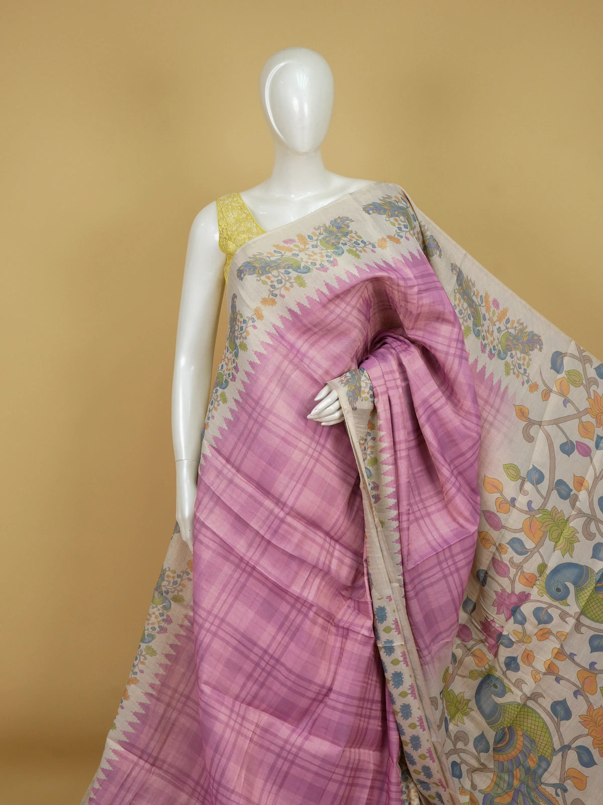 Pink and cream linen cotton saree with checked body, temple border and Kalamkari peacock pallu
