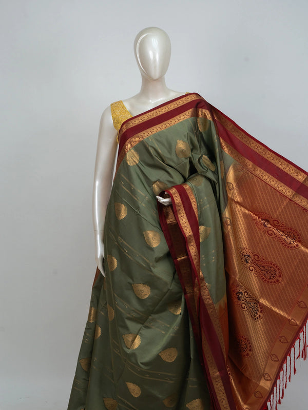 Olive green Kanchipuram fancy silk saree with contrast maroon and gold zari border and paisley pallu
