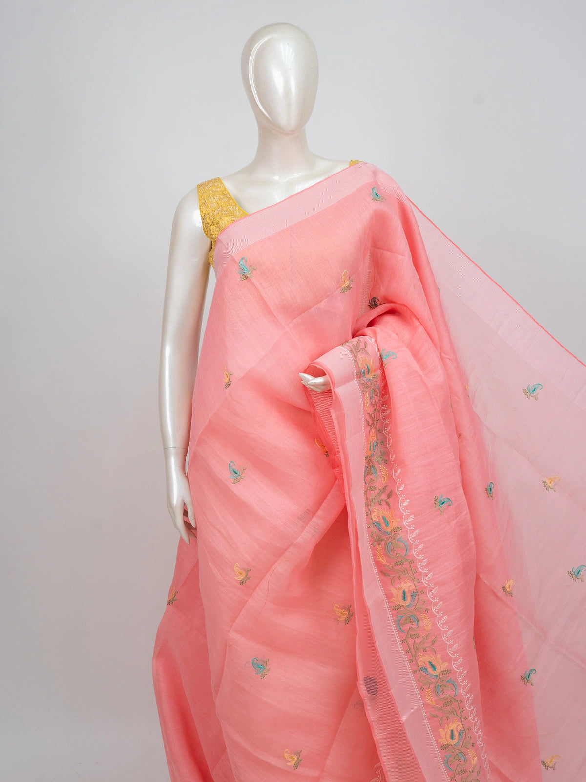 Pink linen cotton saree with embroidered paisley buttas, floral pallu and silver zari border
