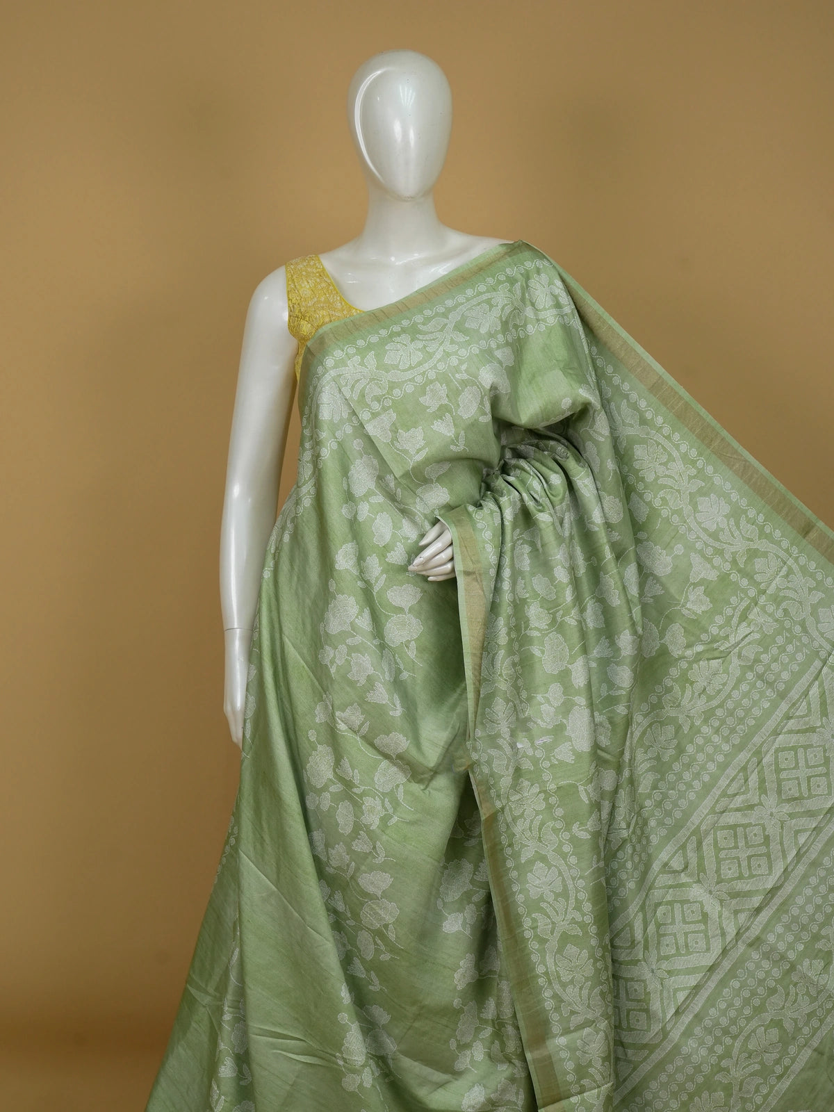 Sage green and white floral Dola silk saree with woven motifs and zari border