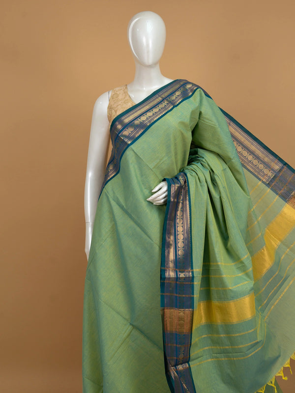 Green Chettinad cotton saree with contrast teal blue gold zari border and zari pallu