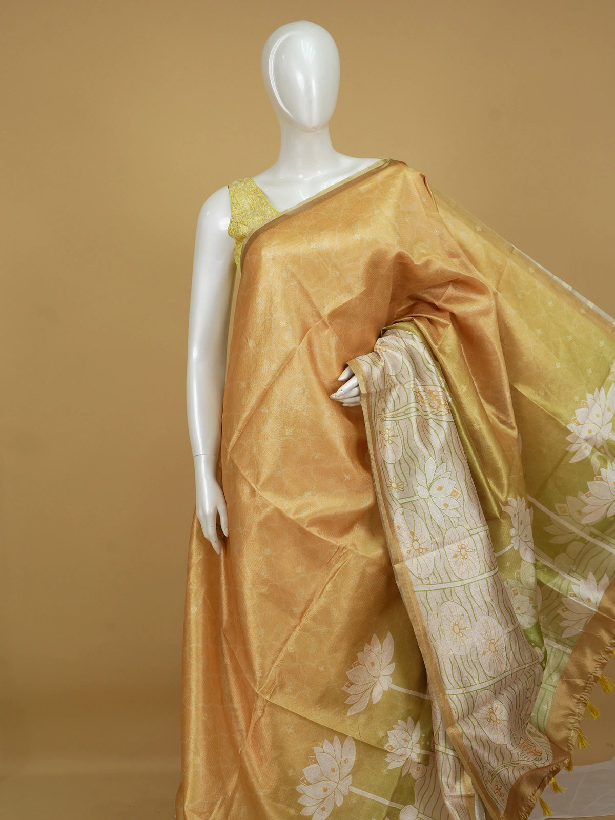 Mustard yellow and olive green Semi Tussar saree with white lotus-pond print and gold zari border