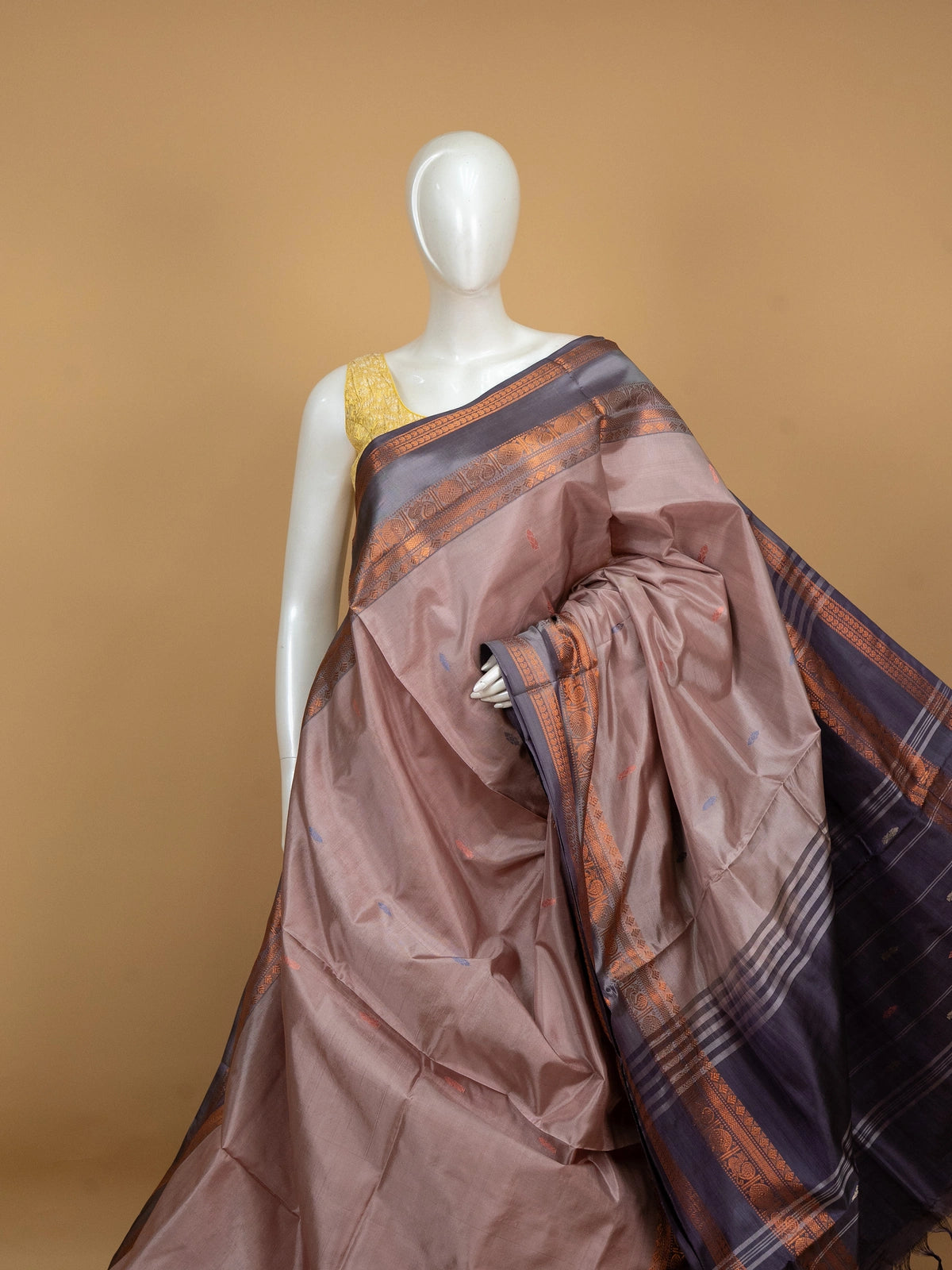 Mauve banana silk saree with navy blue copper zari border and pallu