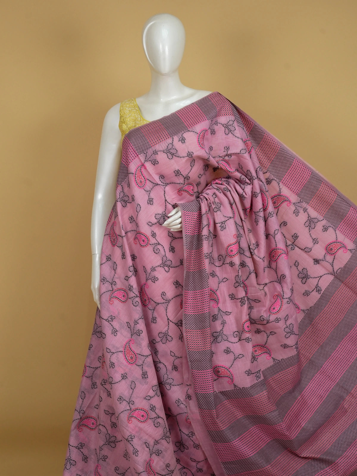 Pink linen cotton saree with kantha-style paisley embroidery and striped grey border