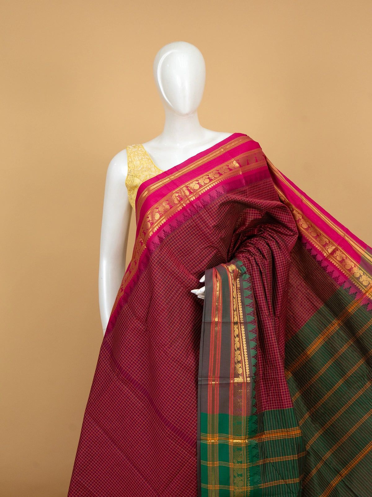 Magenta checked Chettinad cotton saree with pink gold-zari border and green striped pallu