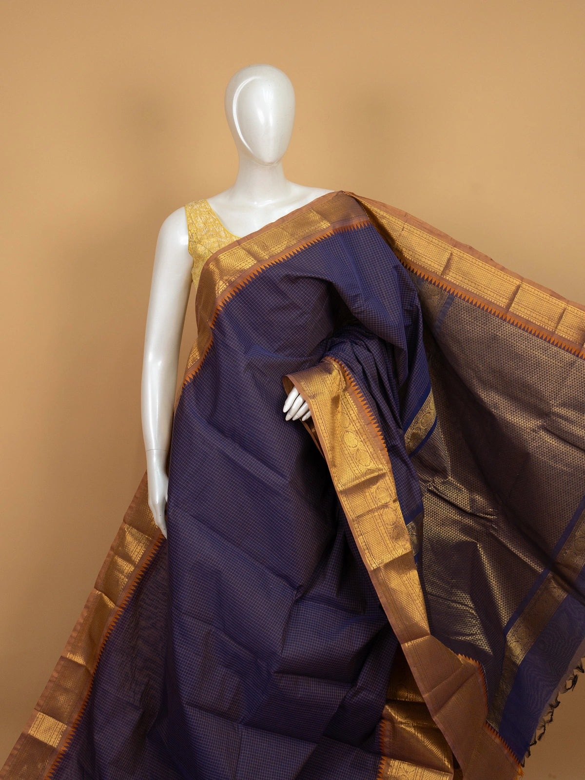 Navy blue Chettinad cotton saree with mustard-gold checks and contrast gold zari temple border