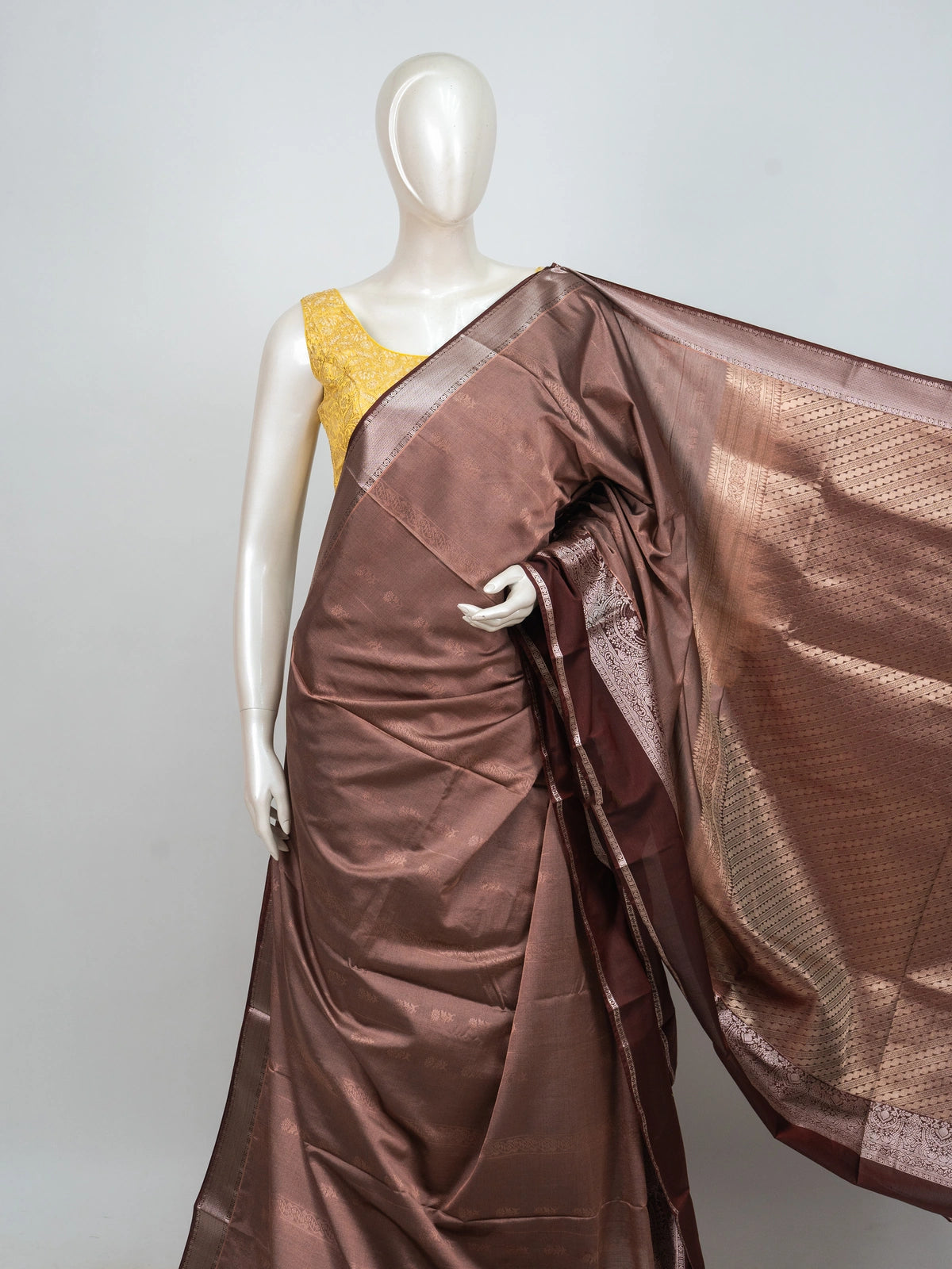 Mauve-brown semi silk saree with copper zari border and woven pallu