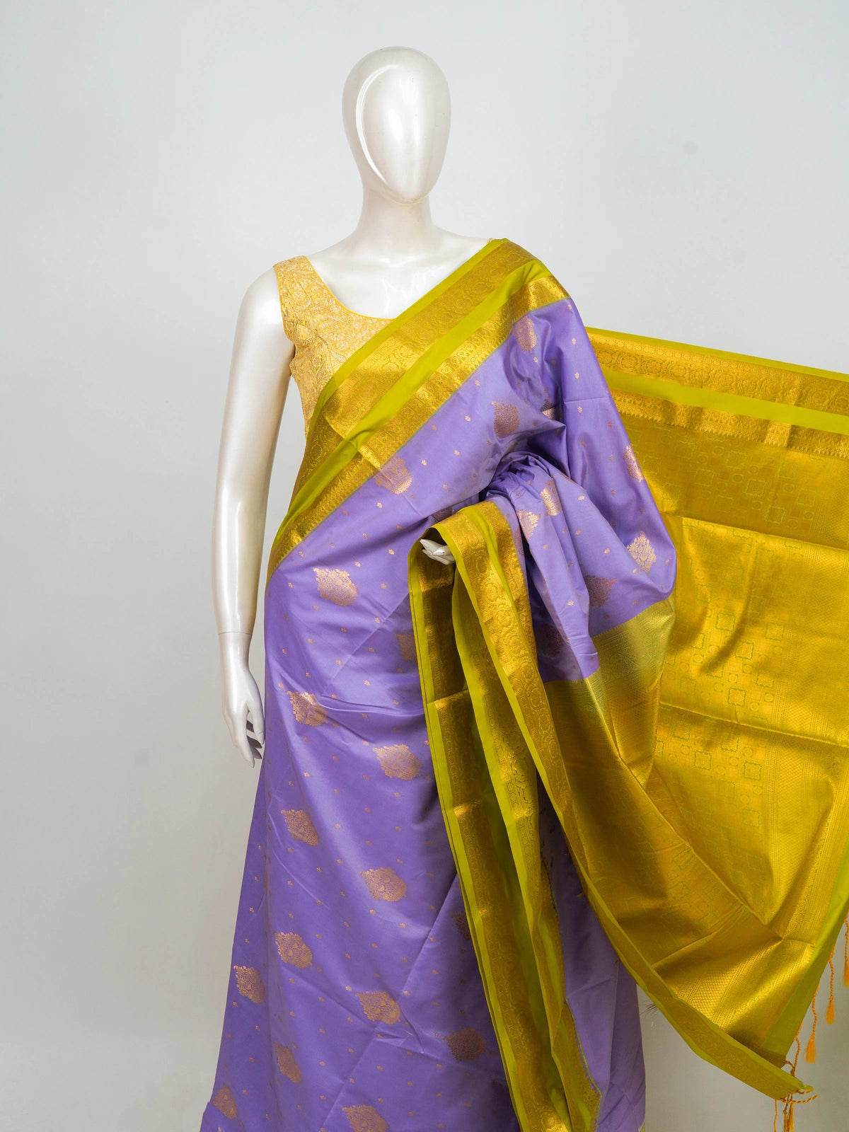 Lavender semi silk saree with contrast lime-green gold zari border and pallu