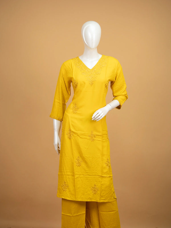 Yellow cotton chikankari embroidered straight cut kurti set with matching pants