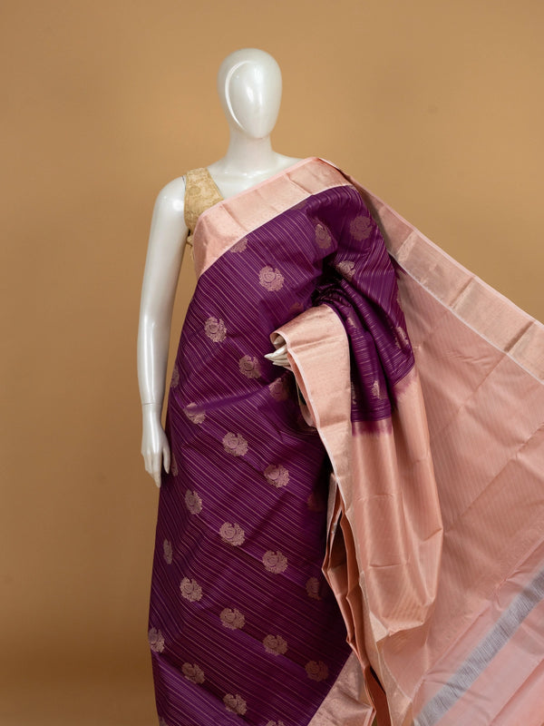 Purple pure Kanchipuram silk saree with peach zari contrast border and paisley zari buttas