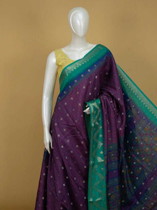 Purple Dola silk saree with teal green contrast zari border and silver zari buttas