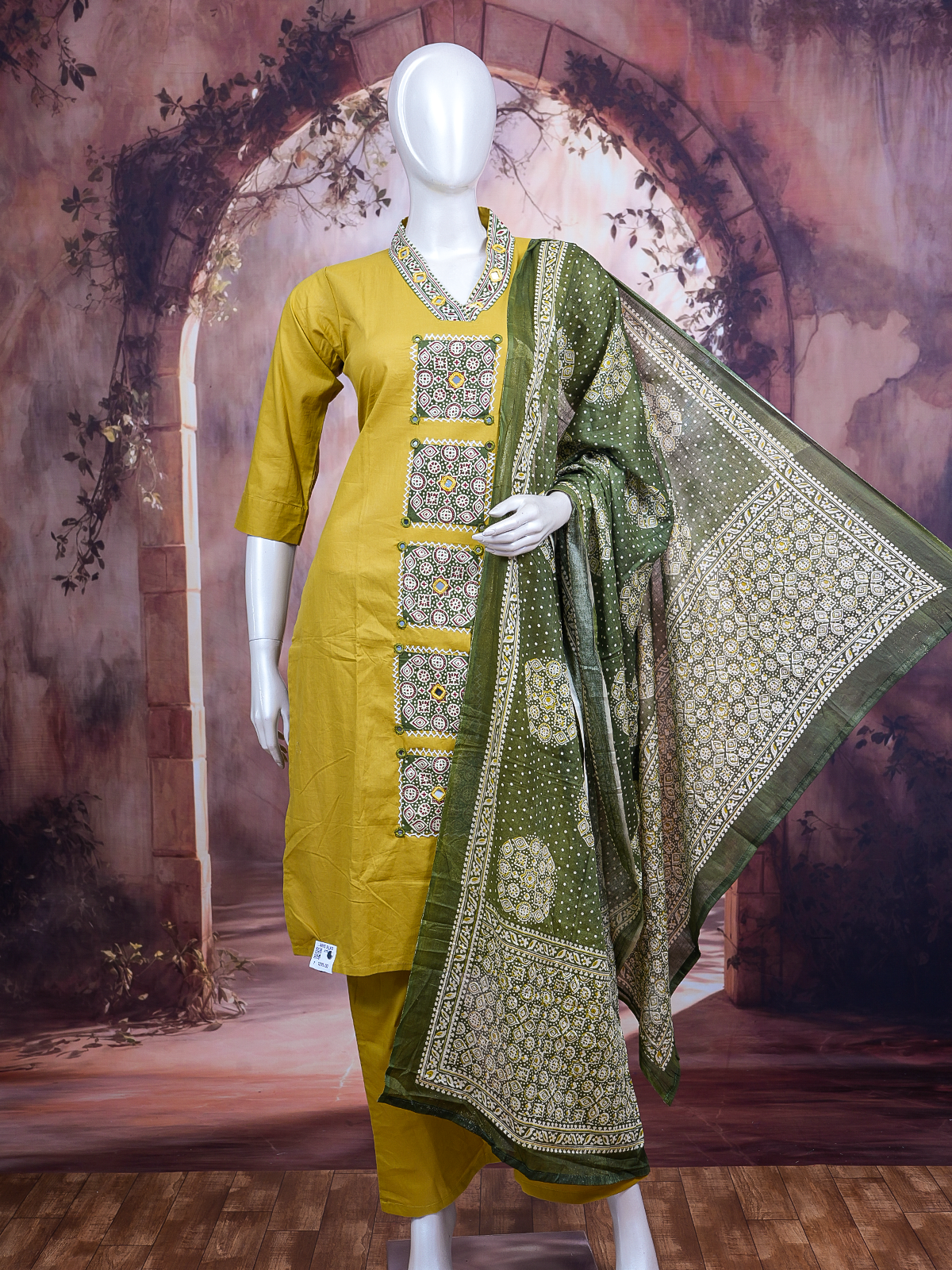 Mustard yellow cotton kurti set with mirror work embroidery and olive green printed dupatta