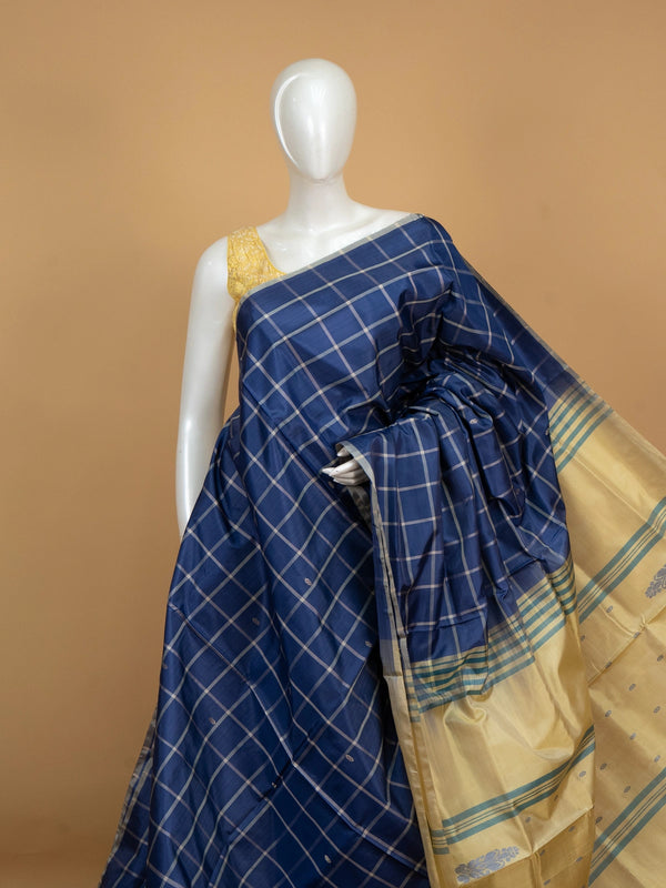 Royal blue and cream checked banana silk saree with woven butta motifs and a striped contrast pallu