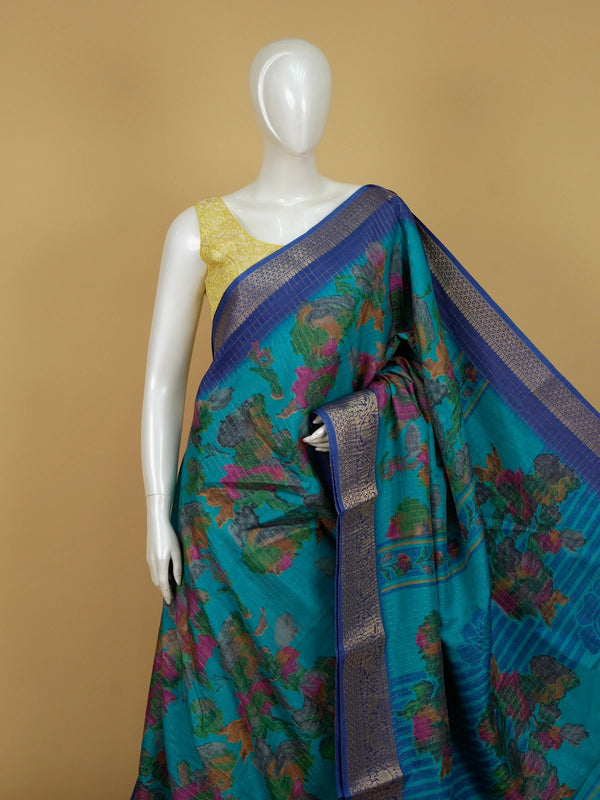 Teal Dola silk saree with multicolour floral print and contrast blue gold zari border