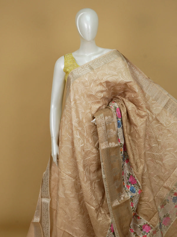 Beige and gold designer tissue saree with woven floral jaal and multicolour floral embroidery