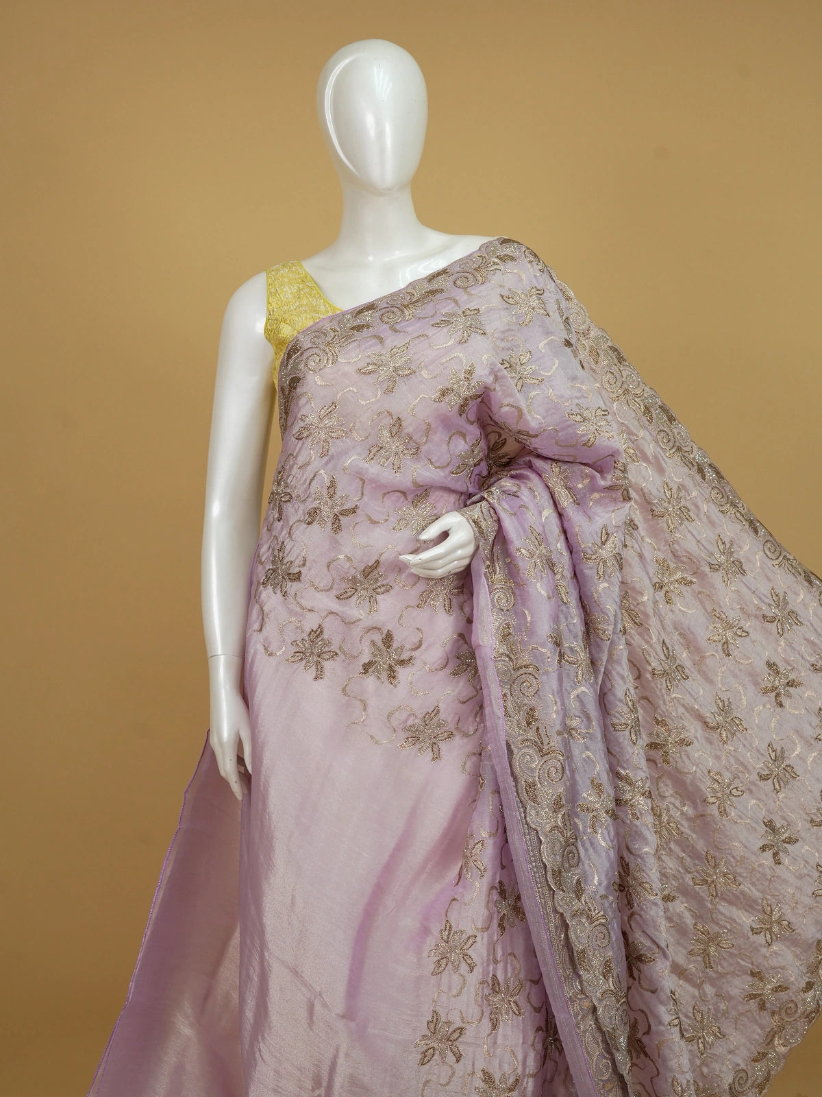 Lavender organza designer saree with gold floral zari and sequin embroidery and scrolled border