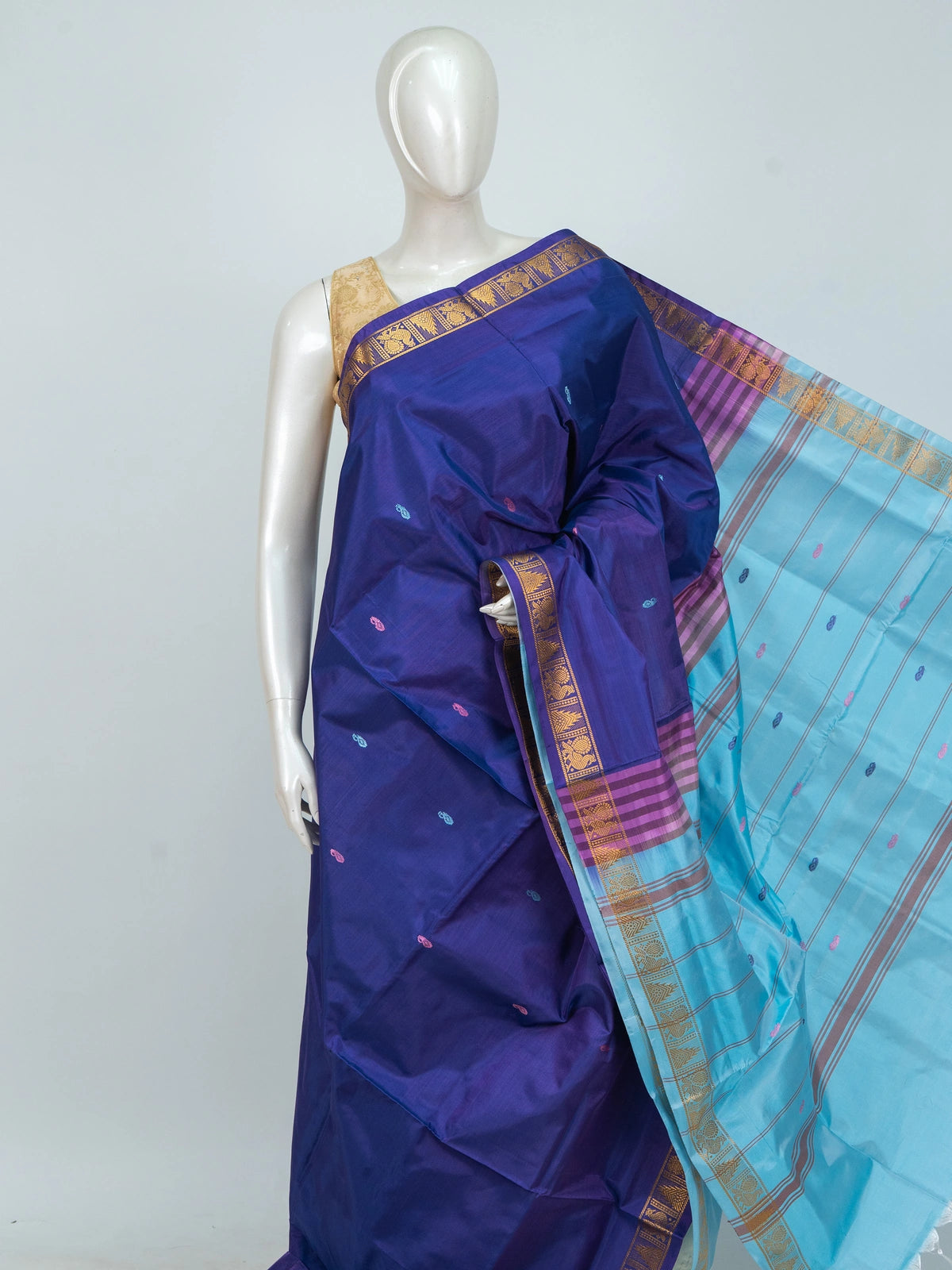 Royal blue Banana silk saree with contrast sky blue pallu and gold zari border