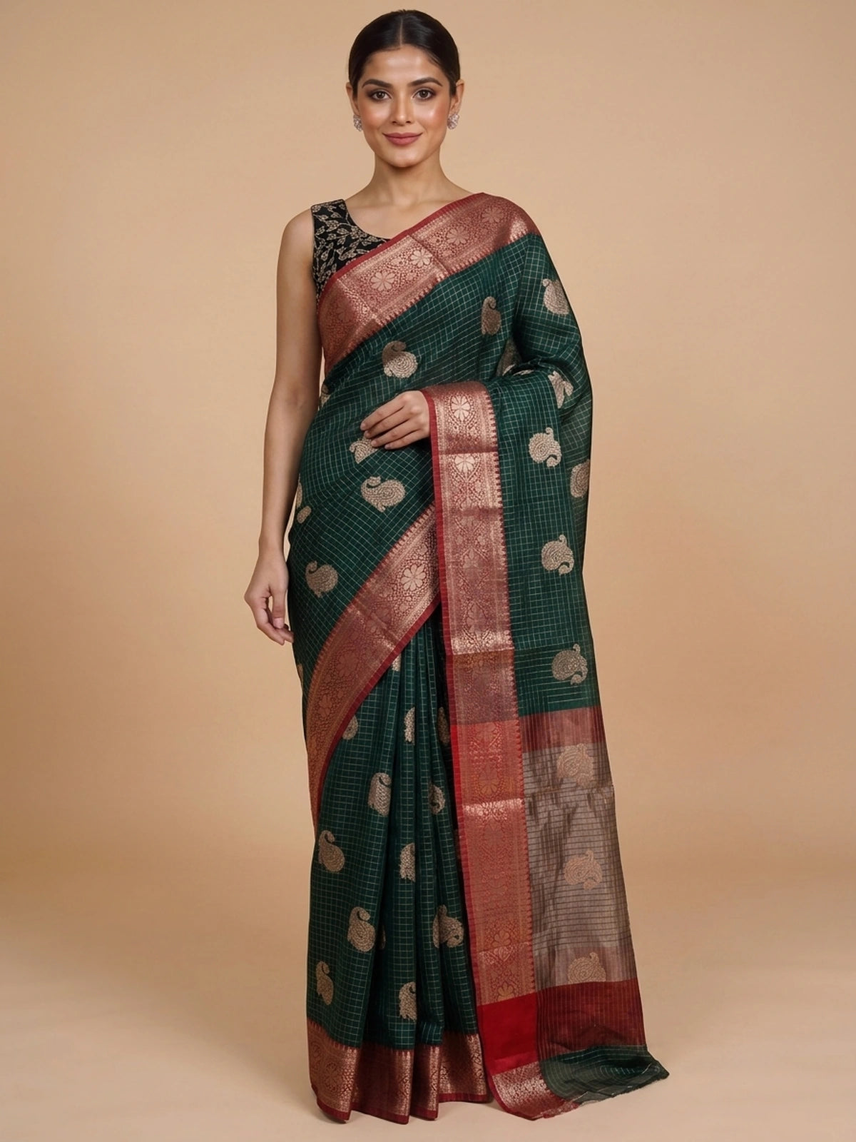 Dark green semi raw silk saree with red contrast zari border and paisley butta motifs