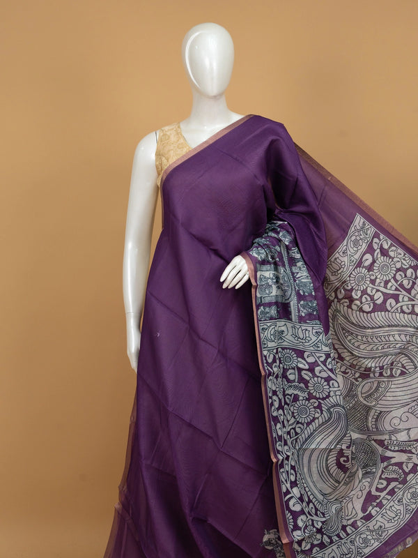 Purple linen cotton saree with white Kalamkari peacock pallu and copper zari border