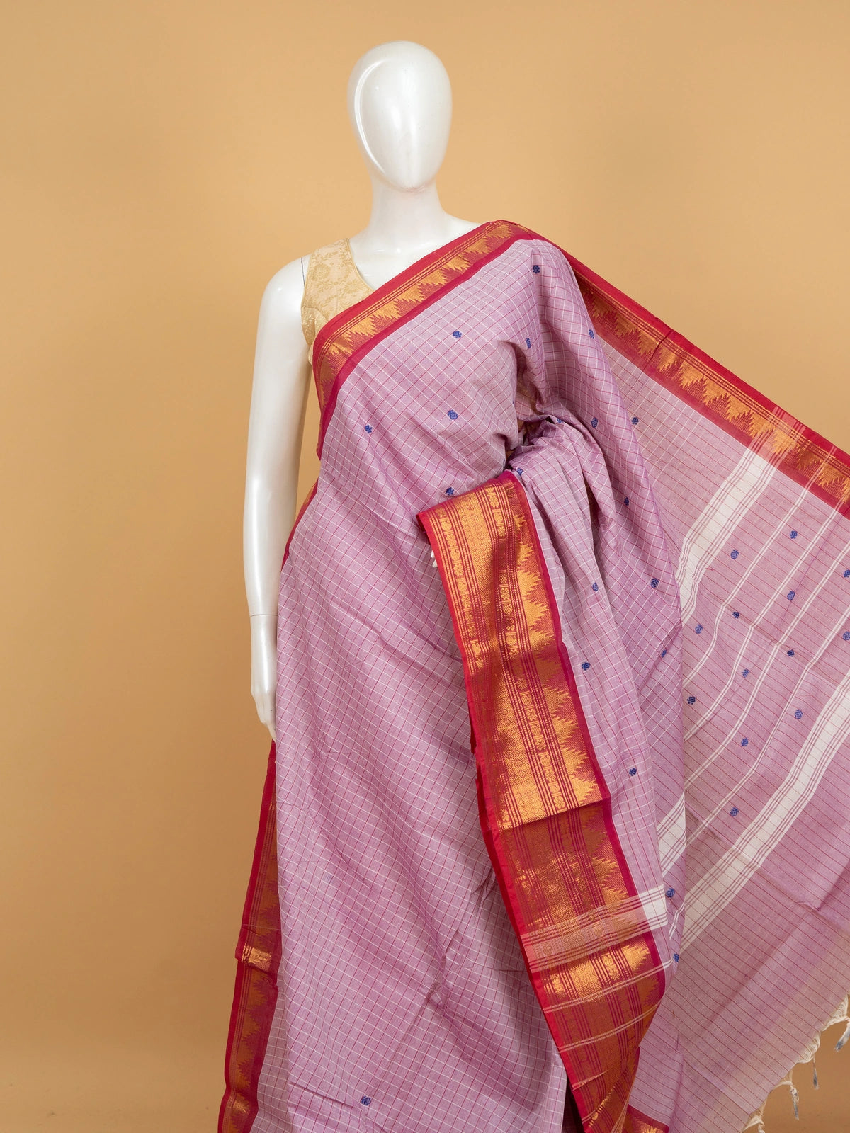 Lilac pink Chettinad cotton saree with red gold zari temple border and blue buttas