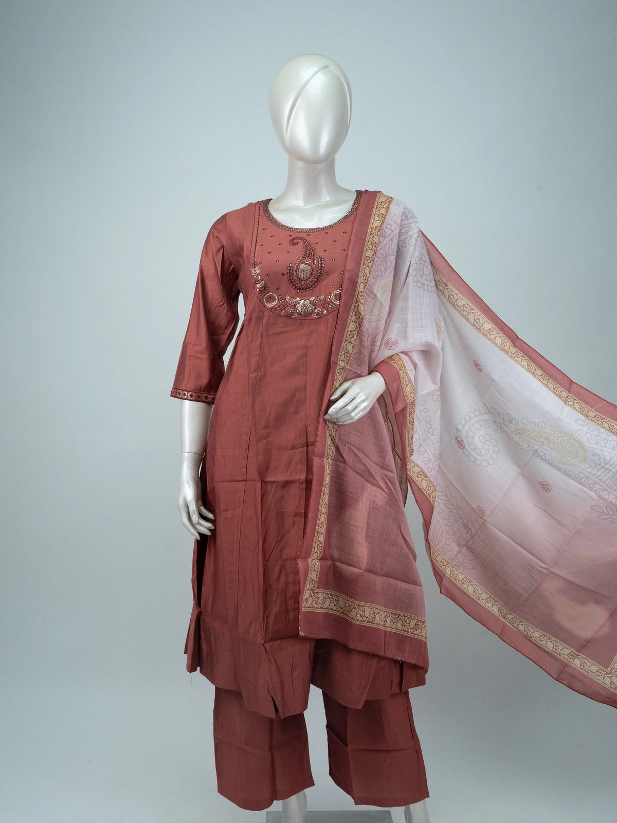 Rust cotton Anarkali kurti set with paisley embroidered yoke, straight pants, and printed cream dupatta